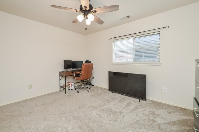 office area featuring ceiling fan and light colored carpet