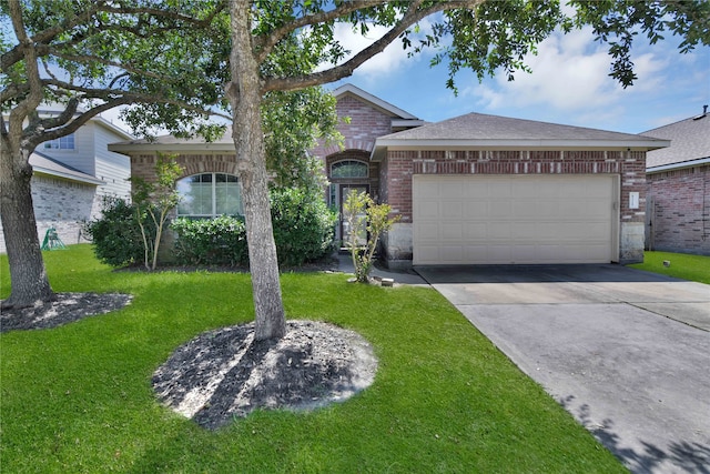 ranch-style home with a front yard and a garage