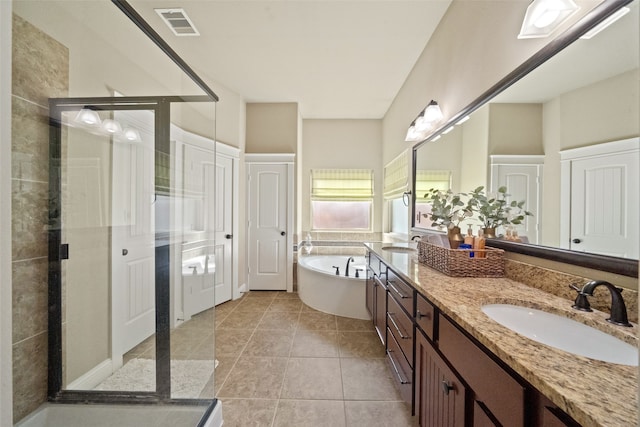 bathroom featuring vanity, separate shower and tub, and tile patterned flooring