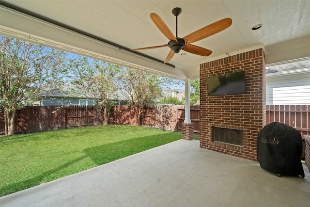 view of patio / terrace with area for grilling and ceiling fan