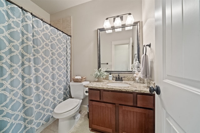 bathroom with vanity, toilet, tile patterned flooring, and a shower with shower curtain