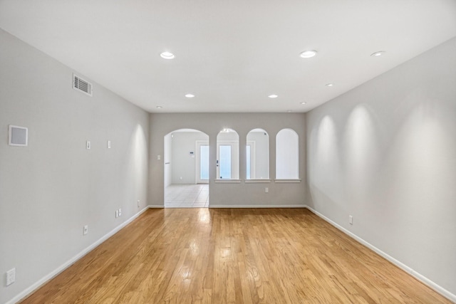 unfurnished room featuring light hardwood / wood-style flooring