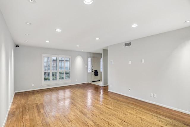 empty room with light wood-type flooring