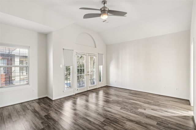 unfurnished room featuring lofted ceiling, french doors, ceiling fan, and dark hardwood / wood-style flooring