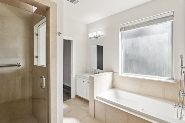 bathroom with vanity, separate shower and tub, and tile patterned floors