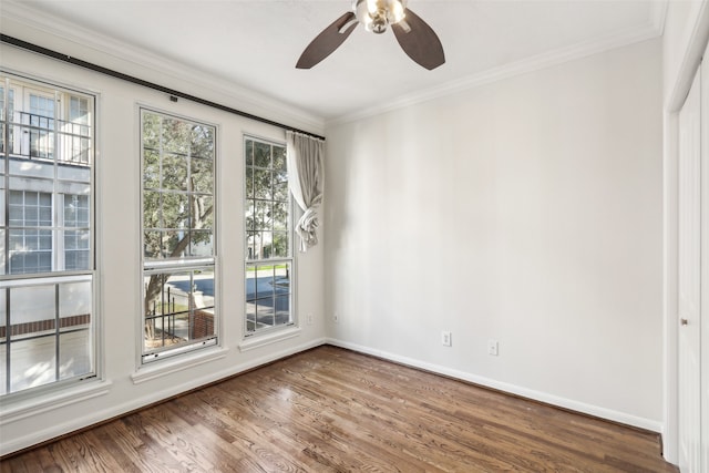 spare room with ornamental molding, hardwood / wood-style floors, and ceiling fan