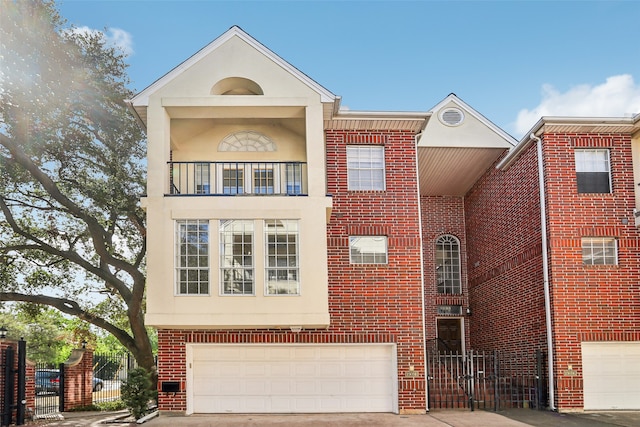 multi unit property featuring a garage