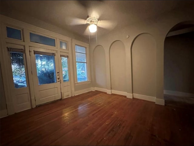 foyer featuring dark hardwood / wood-style floors and ceiling fan