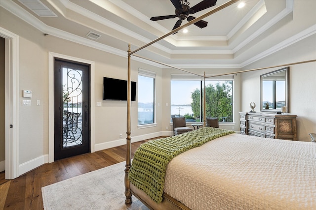 bedroom with access to exterior, ceiling fan, dark hardwood / wood-style floors, and ornamental molding