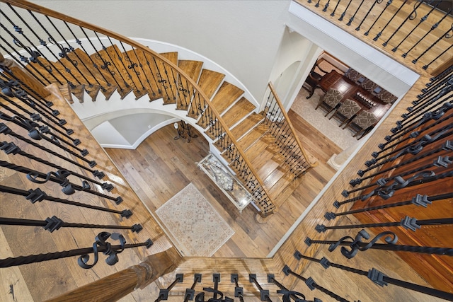 stairs with wood-type flooring