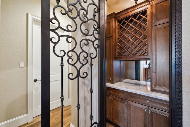 wine room featuring light wood-type flooring