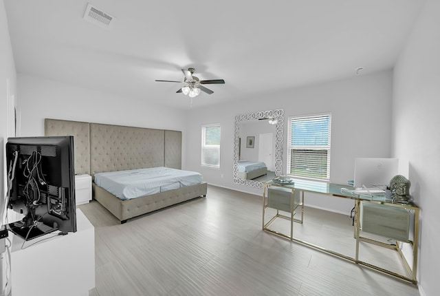 bedroom featuring ceiling fan and light hardwood / wood-style floors