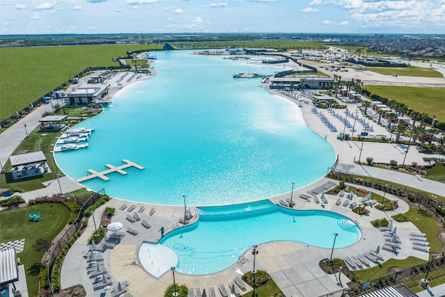 drone / aerial view with a water view