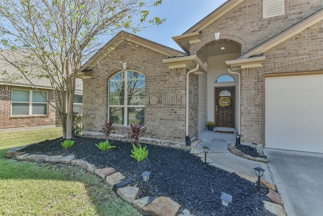 entrance to property featuring a garage