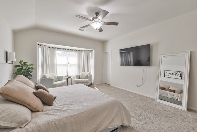 carpeted bedroom with lofted ceiling and ceiling fan