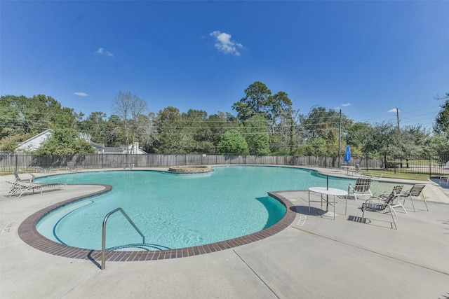 view of pool with a patio