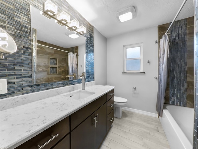 full bathroom with vanity, toilet, and shower / bath combo