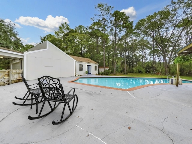 view of pool featuring a patio area