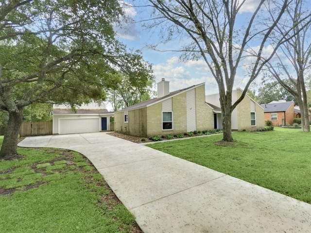 ranch-style home featuring a front yard and a garage