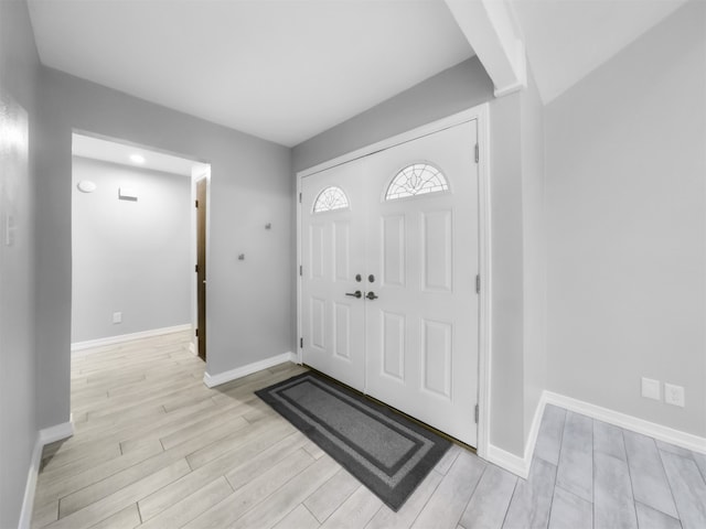 entrance foyer featuring light hardwood / wood-style floors