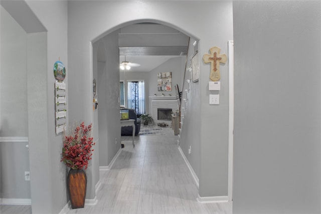 7915 Corrian Park Cir, Houston, TX 77040 - hall featuring arched walkways and baseboards