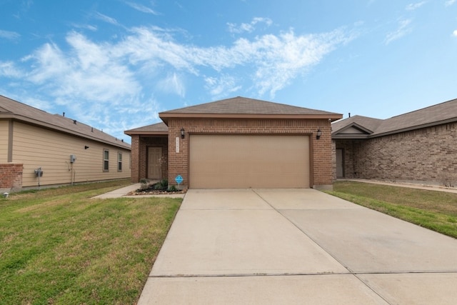 ranch-style house featuring a garage and a front yard