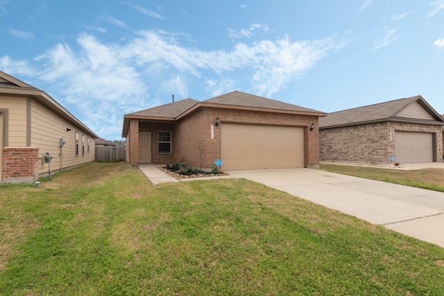 view of front of home featuring a garage and a front yard