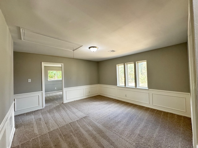 empty room with carpet flooring