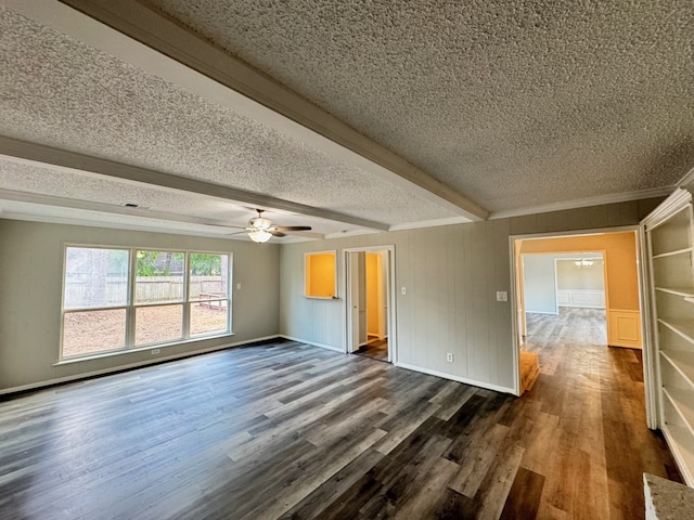 unfurnished living room featuring beamed ceiling, a textured ceiling, dark hardwood / wood-style floors, and ceiling fan