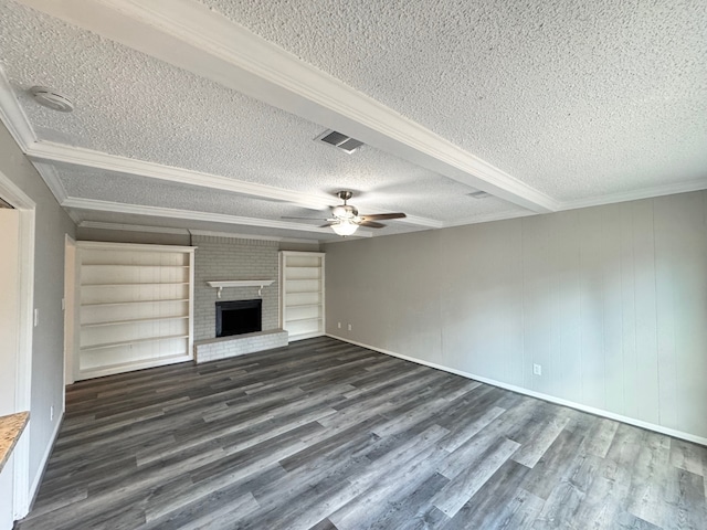 unfurnished living room with a textured ceiling and dark hardwood / wood-style floors