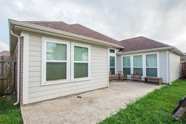 back of house with a patio area