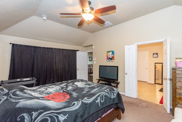 bedroom with ceiling fan, light carpet, and lofted ceiling