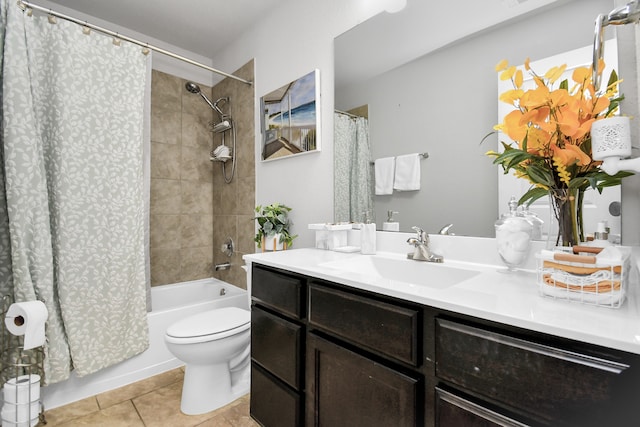 full bathroom with vanity, toilet, tile patterned floors, and shower / tub combo