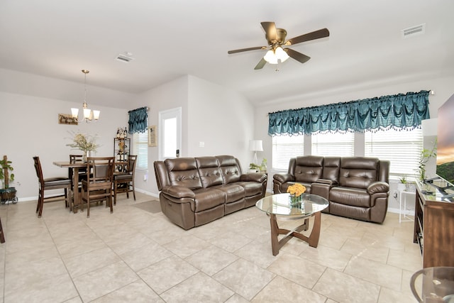 living room with ceiling fan and light tile patterned floors