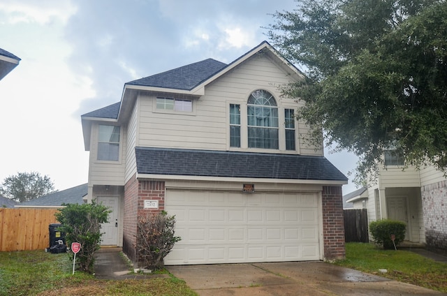 front of property with a garage