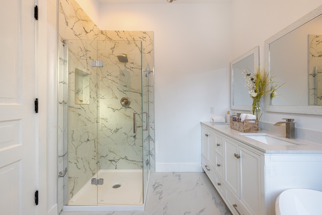 bathroom featuring vanity and an enclosed shower