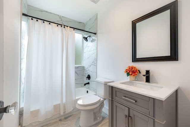 full bathroom with vanity, shower / bath combination with curtain, and toilet