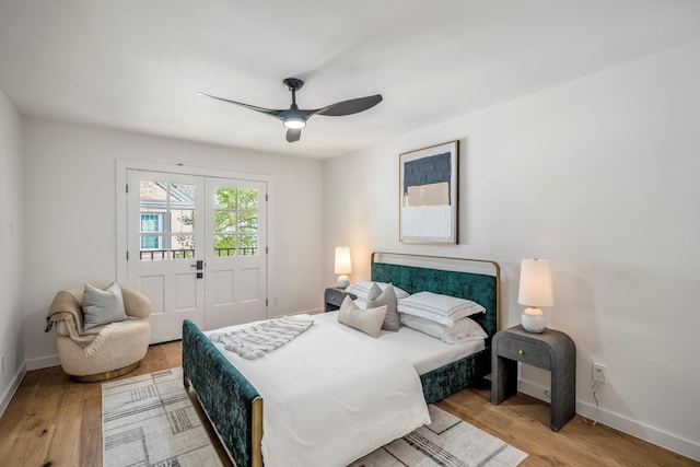 bedroom featuring light wood-type flooring and ceiling fan