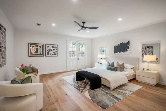 bedroom featuring light hardwood / wood-style flooring and ceiling fan