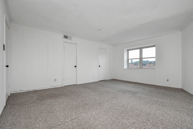 empty room with carpet flooring