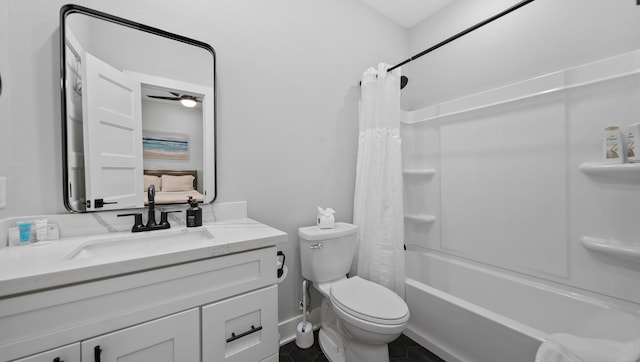 full bathroom with ceiling fan, toilet, shower / bath combo, vanity, and tile patterned floors