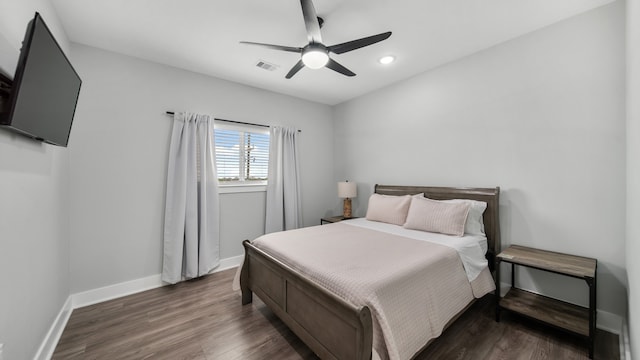 bedroom featuring dark wood-type flooring and ceiling fan