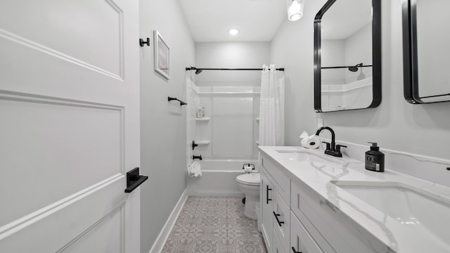 full bathroom featuring vanity, shower / bath combination with curtain, and toilet