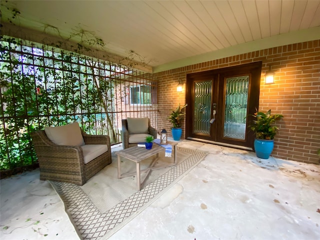 view of patio / terrace with an outdoor hangout area and french doors