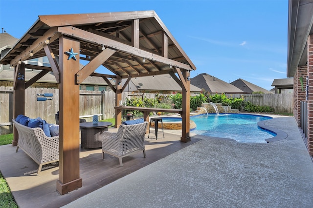 view of pool featuring a patio and pool water feature