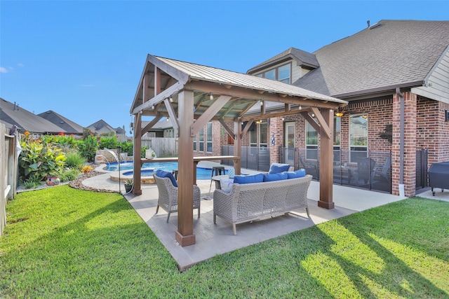 view of patio featuring a gazebo, pool water feature, a covered pool, and an outdoor hangout area