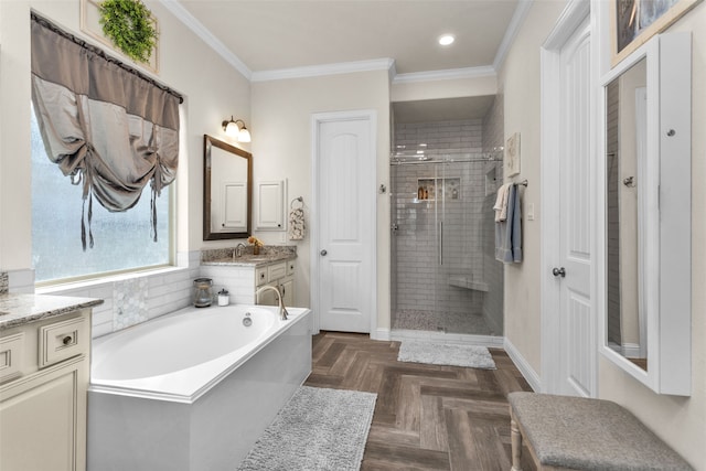 bathroom featuring vanity, crown molding, parquet floors, and independent shower and bath