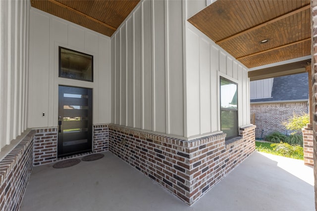 doorway to property featuring a patio area