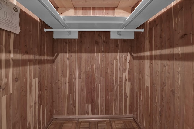 interior details with parquet floors and wood walls