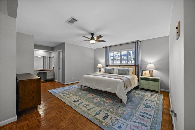 bedroom with dark parquet flooring and ceiling fan